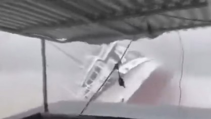 Boat sinks in Ha Long Bay Vietnam