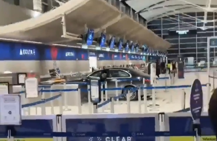 Car storms into Detroit Airport